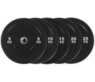 Set of black weight plates with weight markings on a white background