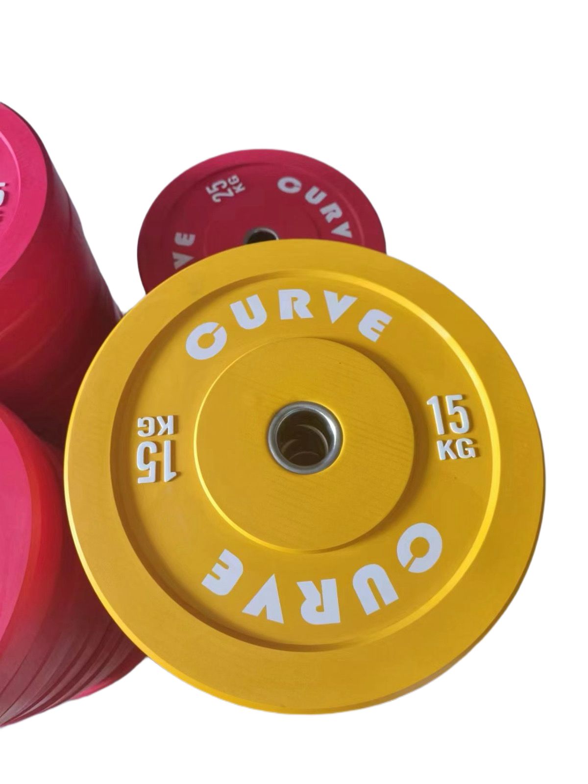Yellow weight plate with 'Curve' branding on a white background