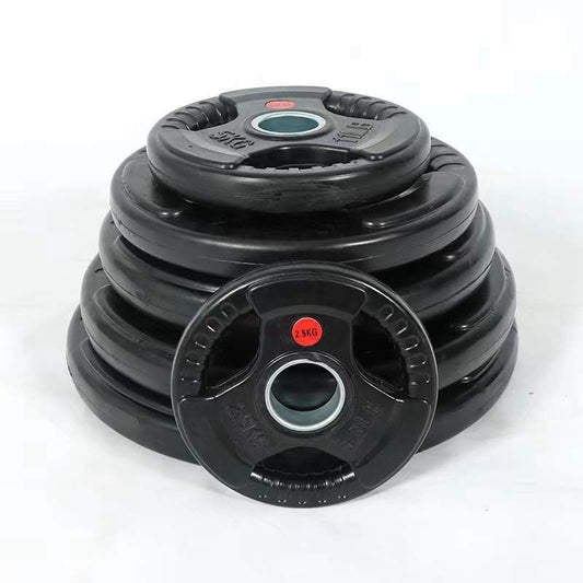 Stack of black weight plates with red labels on a white background